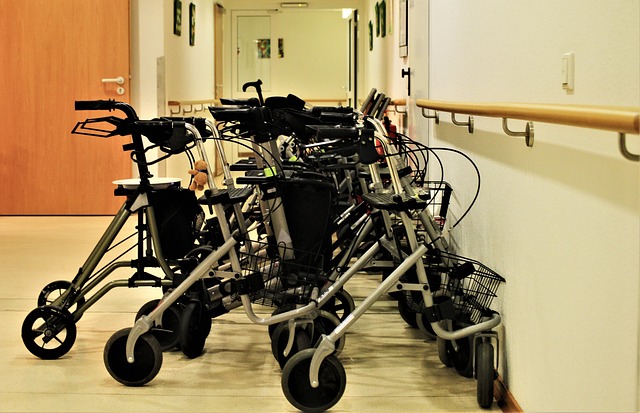 Wheeled mobility aids in a care home corridor with fire safety implications