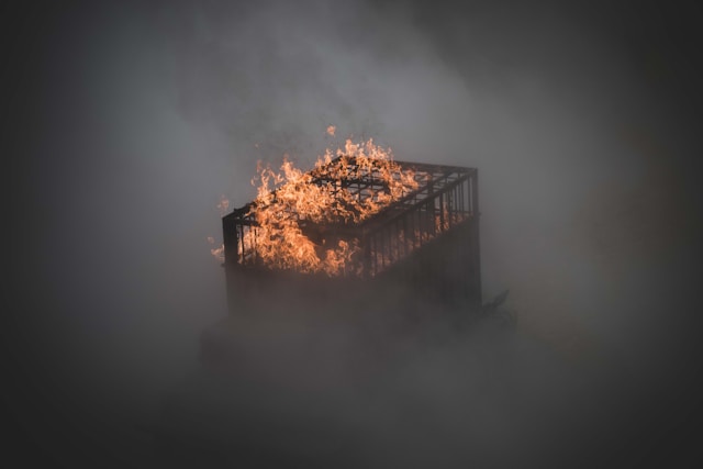 Rooftop fire in a Hotel : Shrouded by smoke.